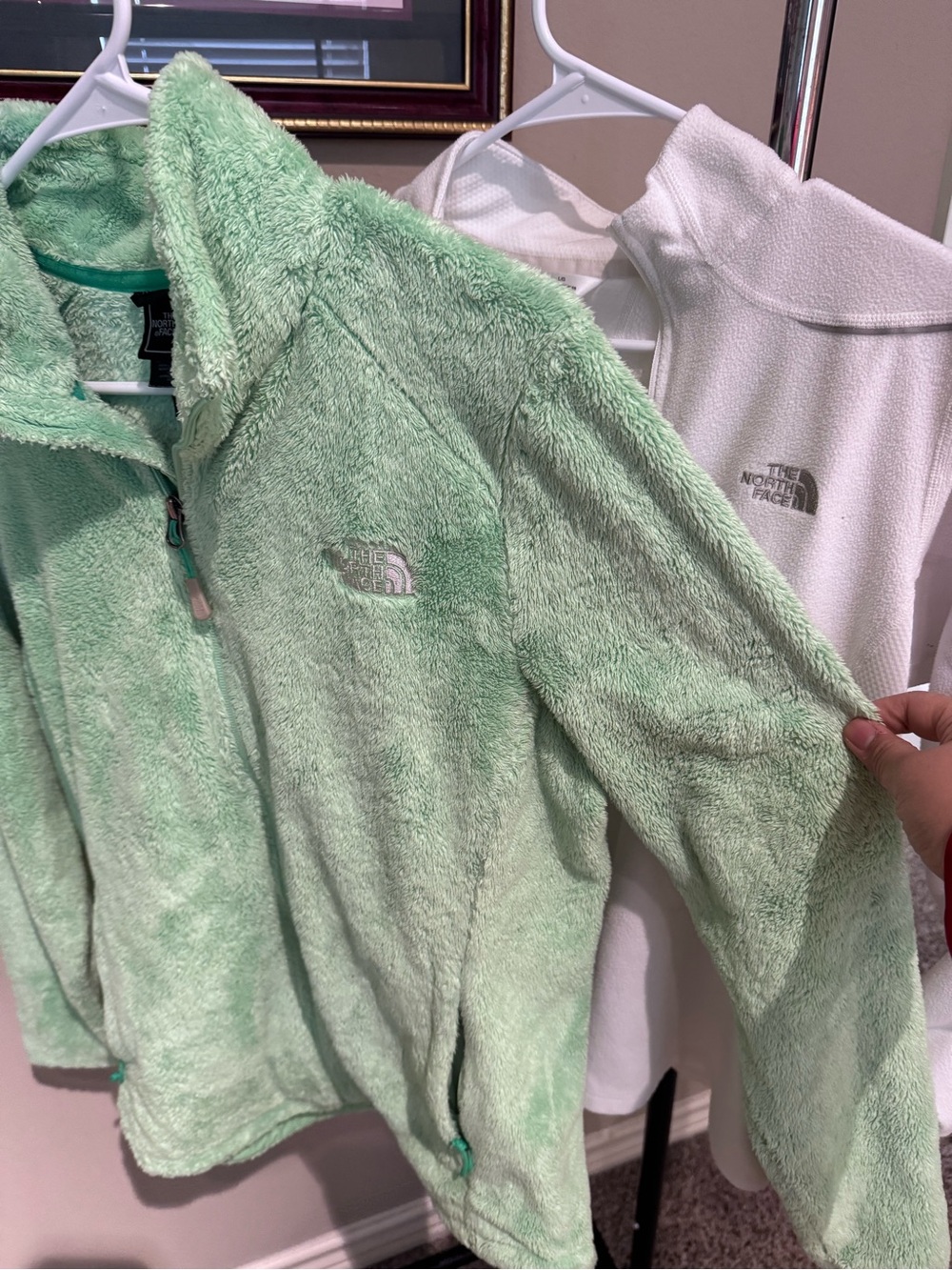 Bundle of two The North Face Green Fleece and half zip white Jacket